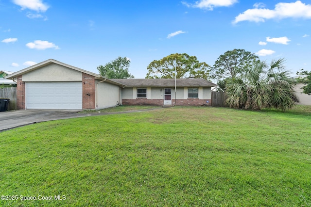 ranch-style home featuring a garage and a front lawn