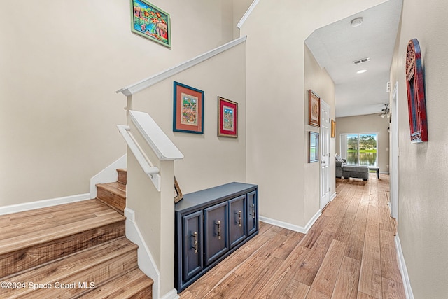 hallway with light wood-type flooring