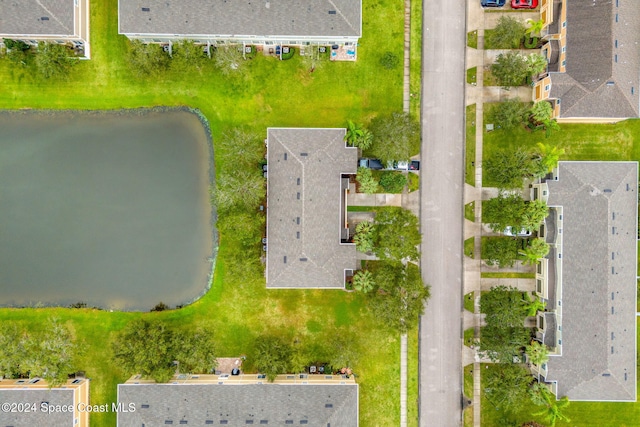 bird's eye view with a water view