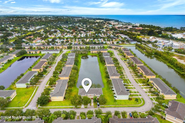 drone / aerial view featuring a water view