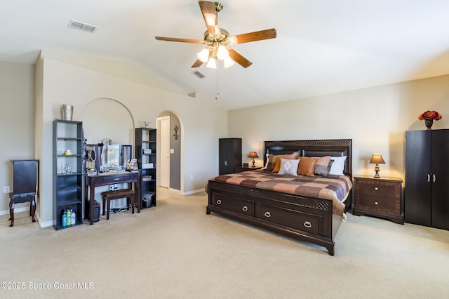 carpeted bedroom featuring lofted ceiling and ceiling fan