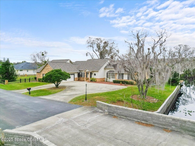 ranch-style house with a front yard