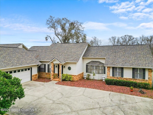 single story home featuring a garage