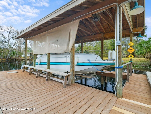 view of dock with a water view