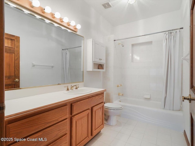 full bathroom featuring shower / bath combination with curtain, vanity, and toilet