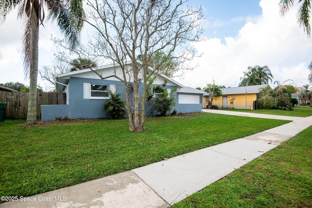 single story home with a front yard