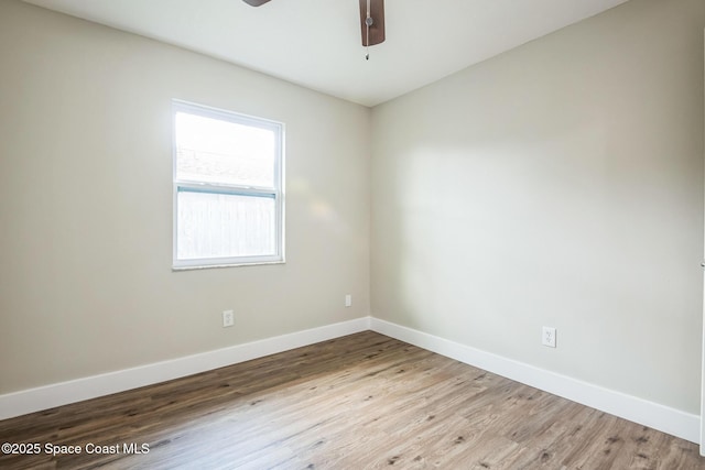 unfurnished room featuring ceiling fan and light wood-type flooring