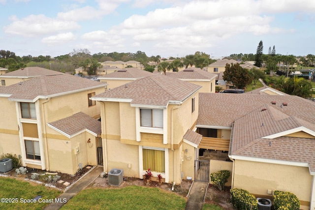 view of front of property with cooling unit