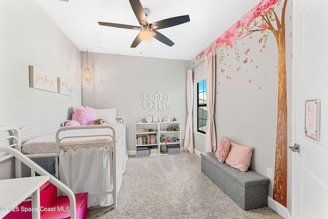 bedroom with lofted ceiling, ceiling fan, and carpet flooring