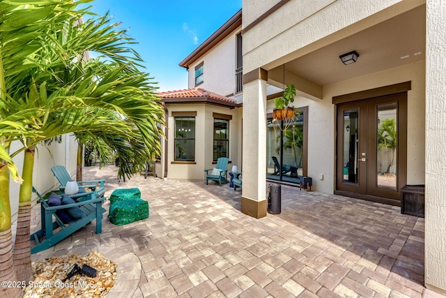 view of patio featuring french doors