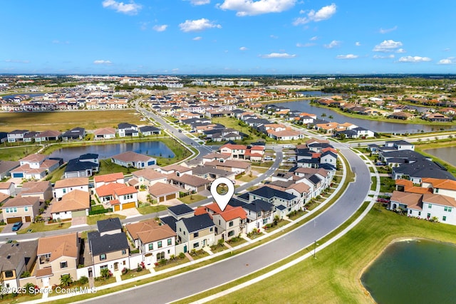 aerial view featuring a water view