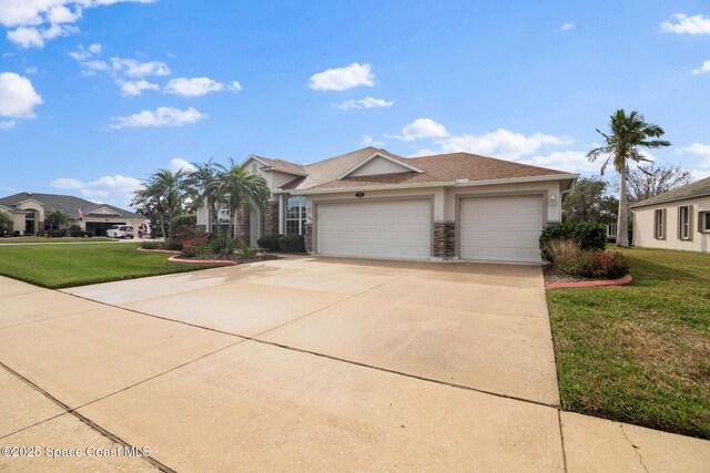 view of front facade featuring a garage and a front lawn