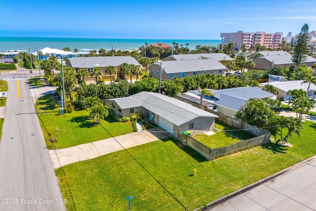 drone / aerial view with a water view