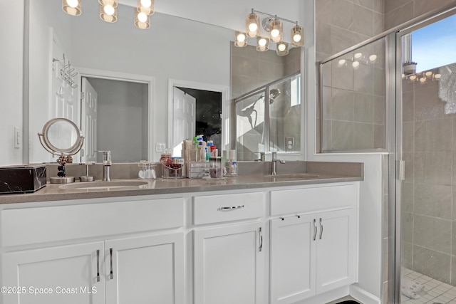 bathroom with vanity and walk in shower