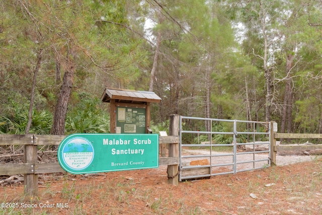 exterior space with a gate and fence