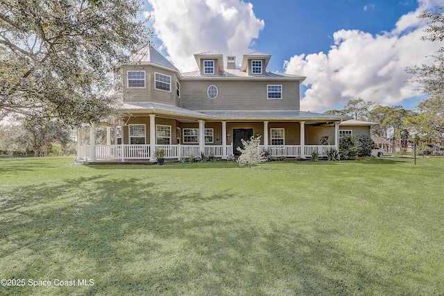 victorian house featuring a porch and a front yard