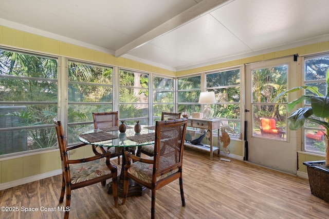 sunroom / solarium with beam ceiling