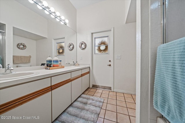 bathroom featuring vanity and tile patterned flooring