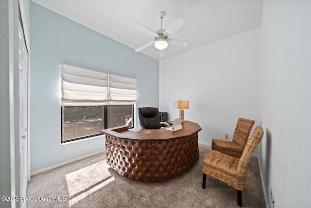 office space with carpet floors and ceiling fan