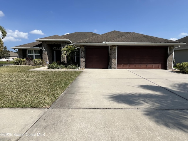 prairie-style house with a garage and a front yard