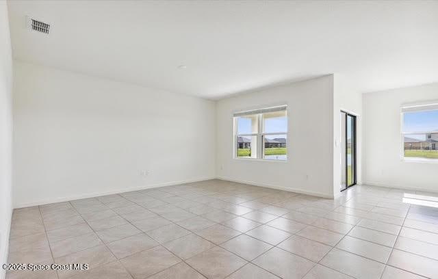 view of tiled empty room