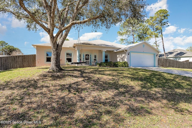 ranch-style home featuring a front yard, a garage, and a porch