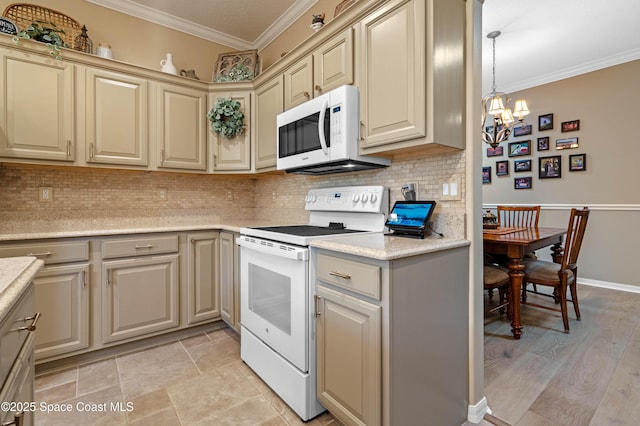 kitchen with crown molding, white appliances, an inviting chandelier, and decorative backsplash