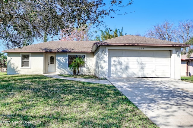 ranch-style home featuring a garage and a front lawn