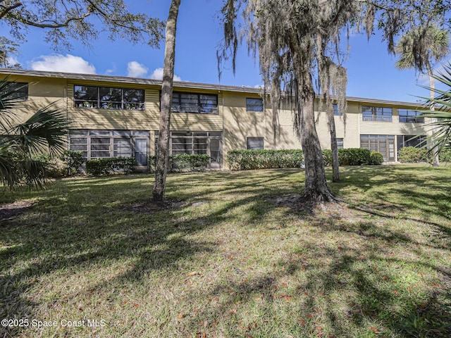 exterior space with a lawn