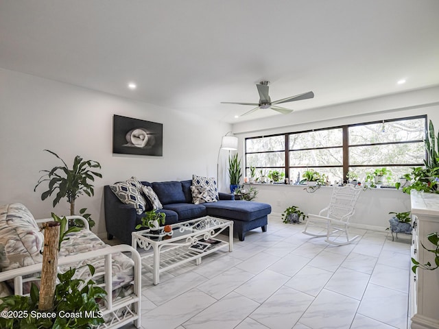 living room featuring ceiling fan