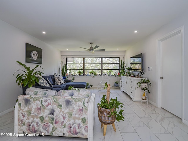 living room with ceiling fan