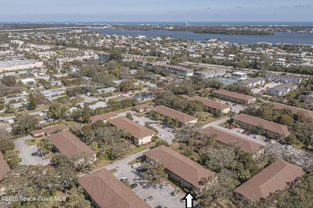 drone / aerial view with a water view