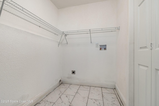 laundry room featuring marble finish floor, washer hookup, baseboards, hookup for an electric dryer, and laundry area