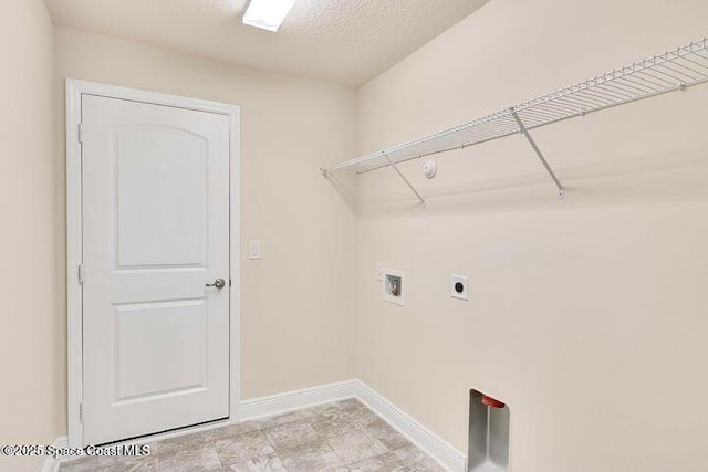 1581 San Filippo Dr SE, Palm Bay, FL 32909 - laundry room featuring baseboards, washer hookup, and electric dryer hookup