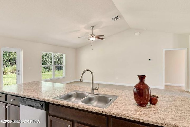 1581 San Filippo Dr SE, Palm Bay, FL 32909 - kitchen featuring dishwasher, a sink, vaulted ceiling, a ceiling fan, and dark brown cabinetry