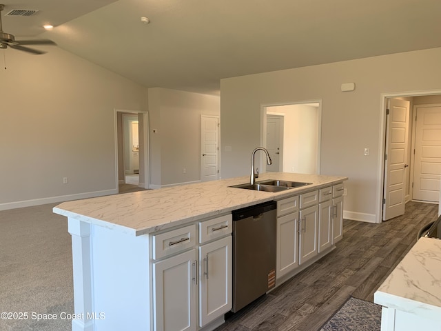 1581 San Filippo Dr SE, Palm Bay, FL 32909 - kitchen featuring stainless steel dishwasher, a ceiling fan, white cabinetry, vaulted ceiling, and an island with sink