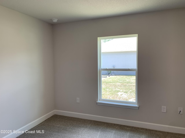 1581 San Filippo Dr SE, Palm Bay, FL 32909 - carpeted spare room with a smoke detector and healthy amount of natural light