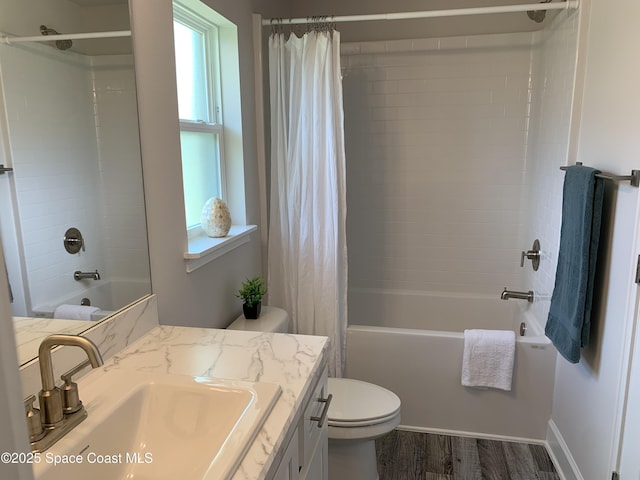 1581 San Filippo Dr SE, Palm Bay, FL 32909 - bathroom featuring vanity, shower / bath combo with shower curtain, and wood finished floors