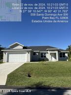 view of front of house featuring a garage and a front yard