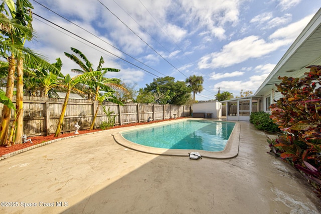 view of swimming pool featuring a patio area