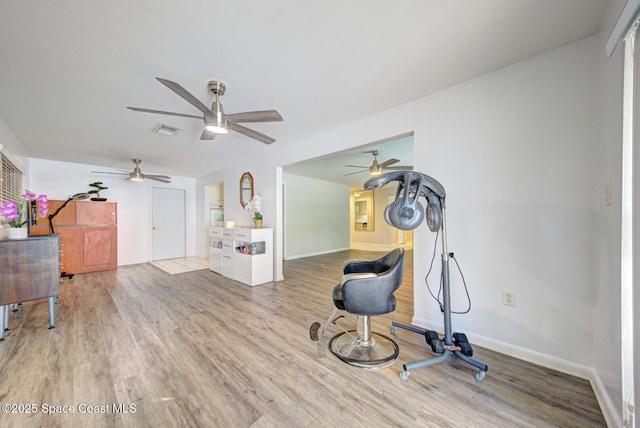 workout room featuring hardwood / wood-style flooring