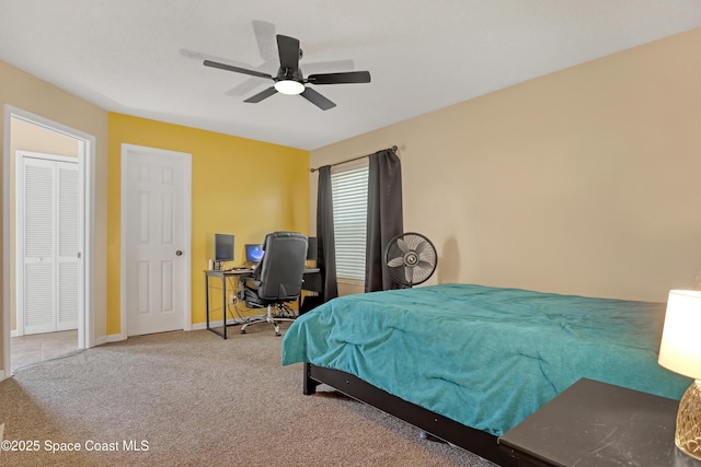 bedroom featuring ceiling fan and carpet floors