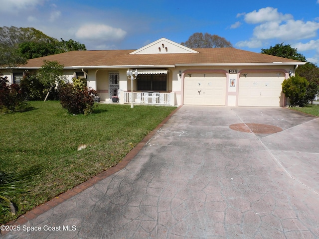 ranch-style house featuring a garage and a front lawn