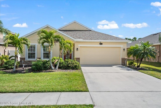 view of front facade featuring a garage and a front lawn