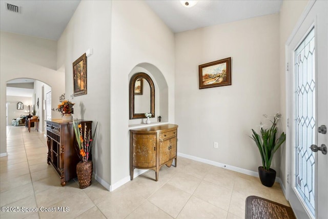 interior space featuring light tile patterned floors