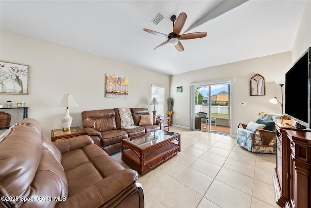 living room with light tile patterned floors and ceiling fan