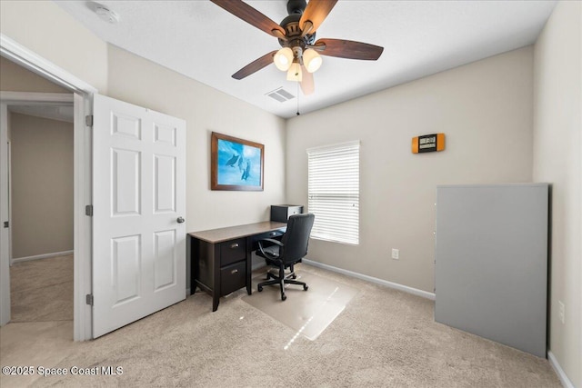 office area with light colored carpet and ceiling fan