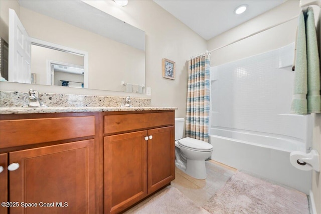 full bathroom with shower / bath combination with curtain, vanity, toilet, and tile patterned flooring