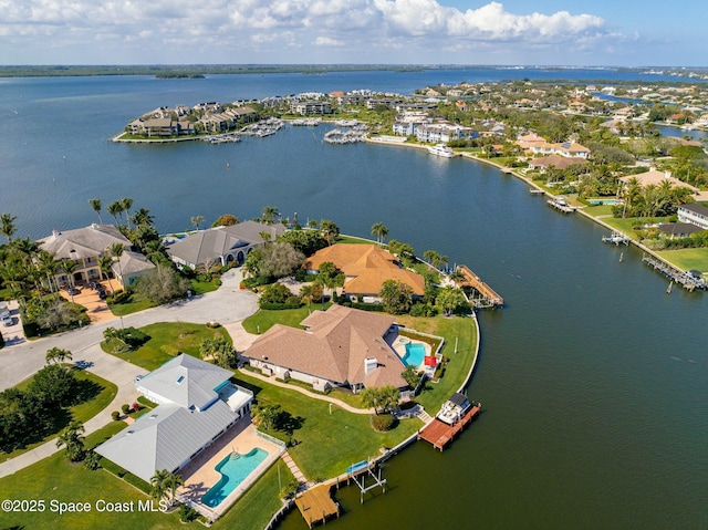 drone / aerial view featuring a water view