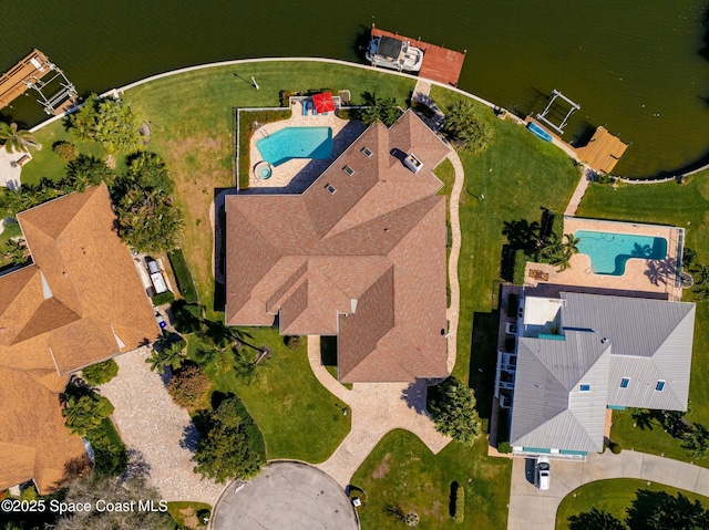 bird's eye view with a water view